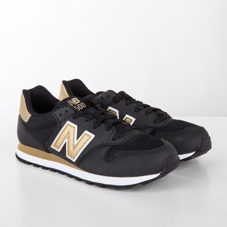 new balance noires et dorees